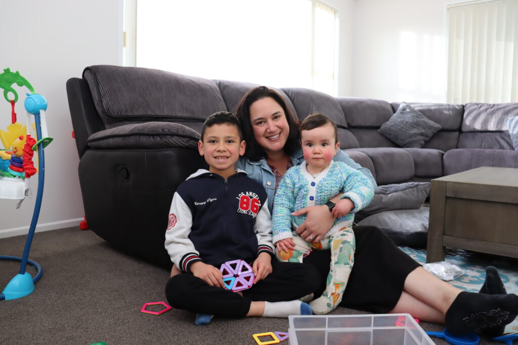 Leah, Mary Potter Hospice volunteer, and her two children at home