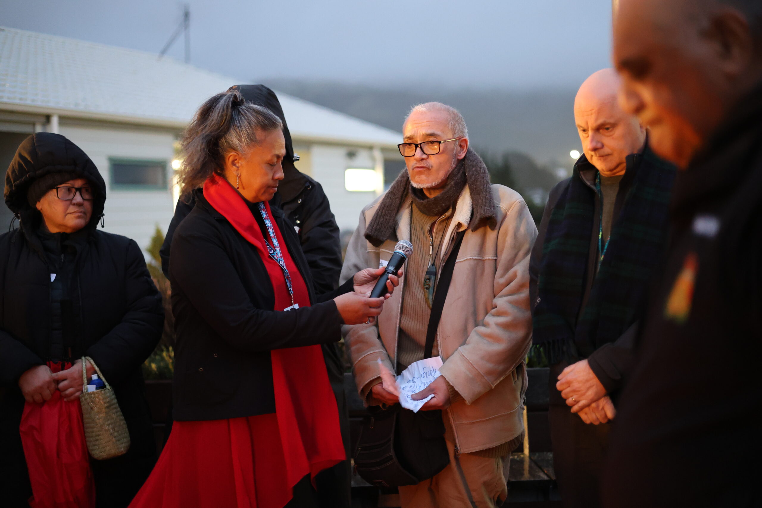 Community members connecting and sharing stories over kai.